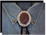 Crazy Horse Antique Scroll Bolo Tie